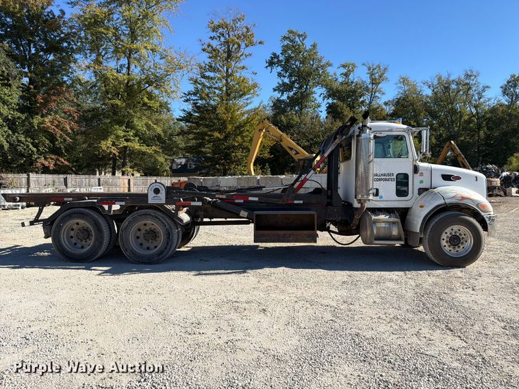 image for item FC3401 2005 Peterbilt 335 roll-off container truck