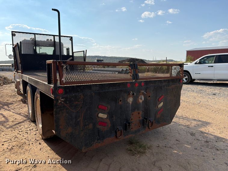 image for item FI0376 2002 Freightliner FLD120 flatbed truck