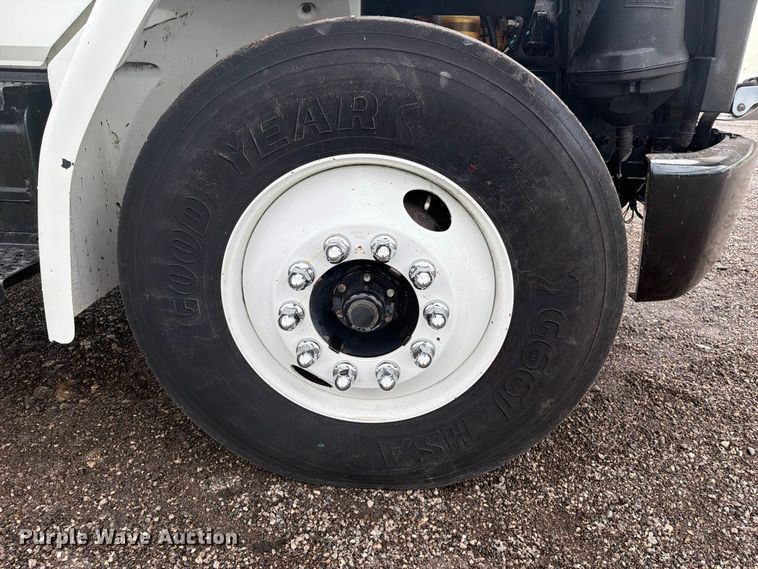 image for item FW3527 2004 Freightliner FL70 flatbed truck