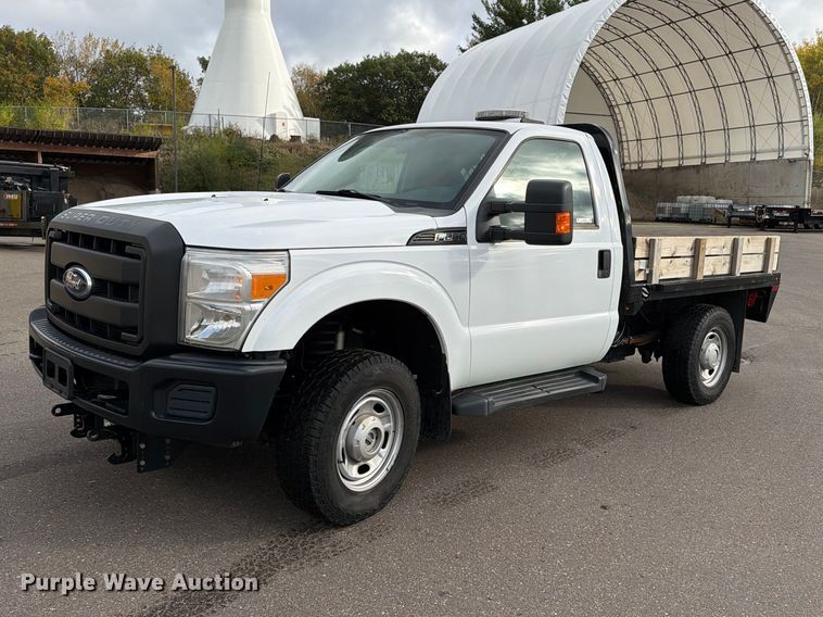 image for item EX1070 2011 Ford F250 Super Duty flatbed pickup truck