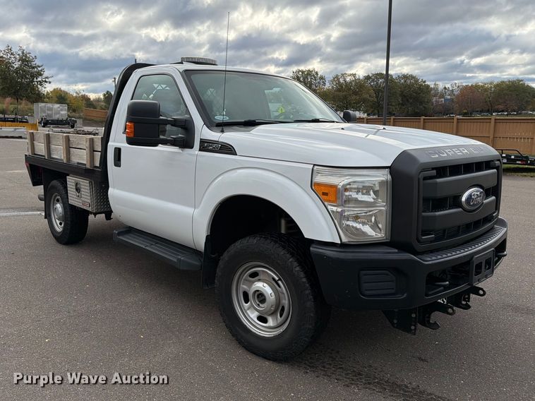 image for item EX1070 2011 Ford F250 Super Duty flatbed pickup truck