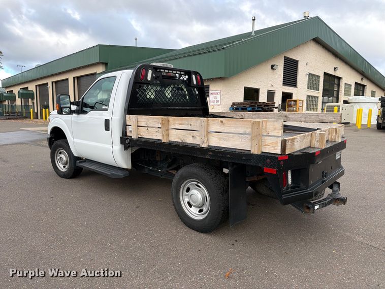 image for item EX1070 2011 Ford F250 Super Duty flatbed pickup truck