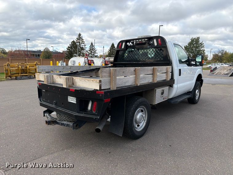 image for item EX1070 2011 Ford F250 Super Duty flatbed pickup truck