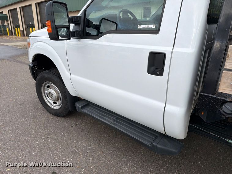 image for item EX1070 2011 Ford F250 Super Duty flatbed pickup truck
