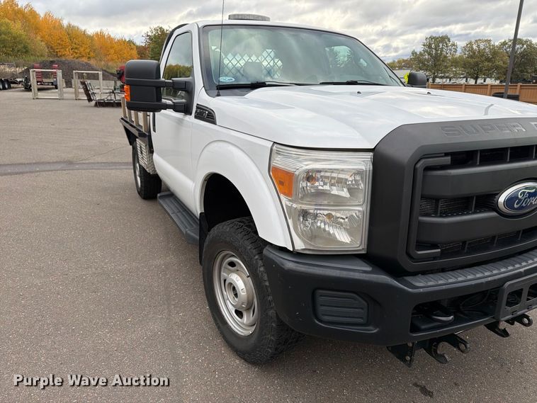 image for item EX1070 2011 Ford F250 Super Duty flatbed pickup truck
