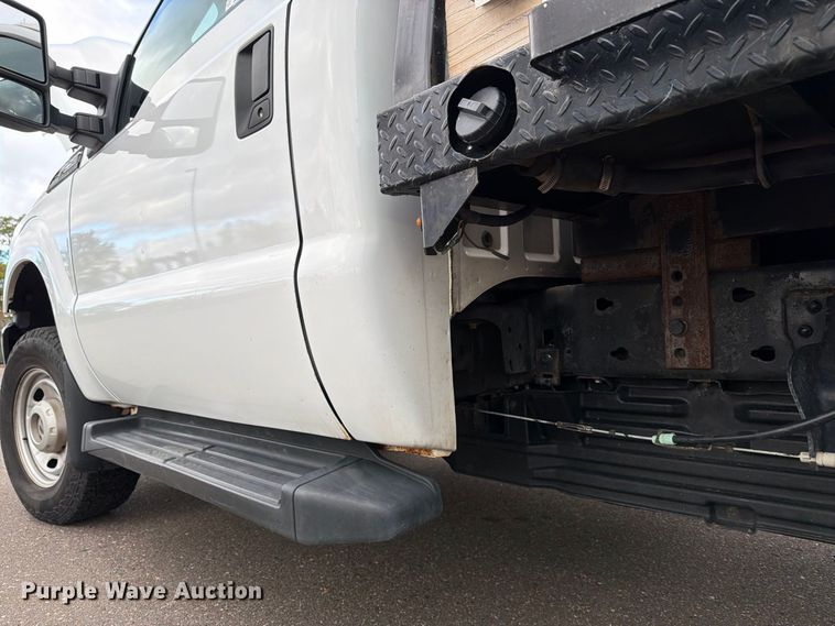 image for item EX1070 2011 Ford F250 Super Duty flatbed pickup truck