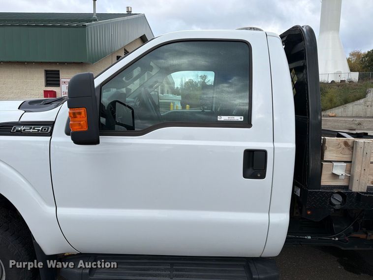 image for item EX1070 2011 Ford F250 Super Duty flatbed pickup truck