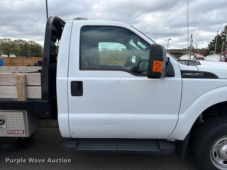 image for item EX1070 2011 Ford F250 Super Duty flatbed pickup truck