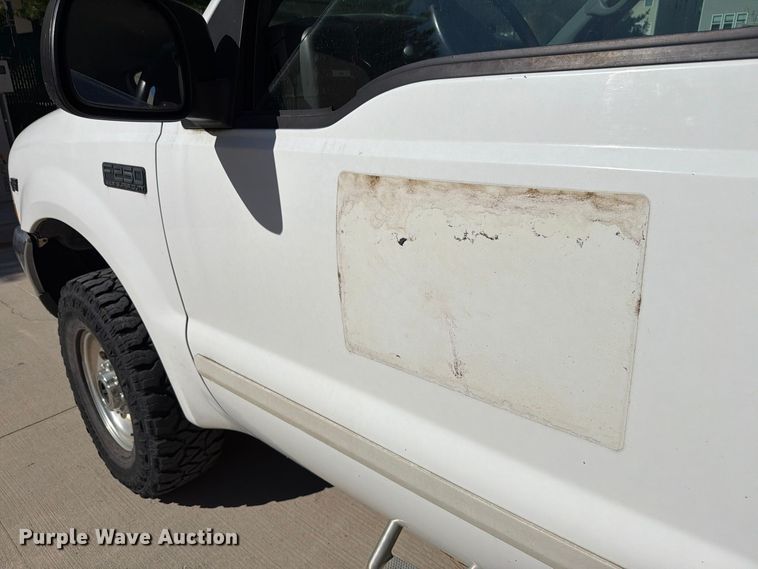 image for item FH6487 2002 Ford F250 Super Duty flatbed pickup truck