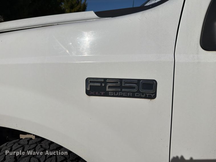 image for item FH6487 2002 Ford F250 Super Duty flatbed pickup truck