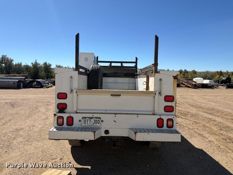 image for item FM7718 2020 RAM 3500 Crew Cab utility bed pickup truck