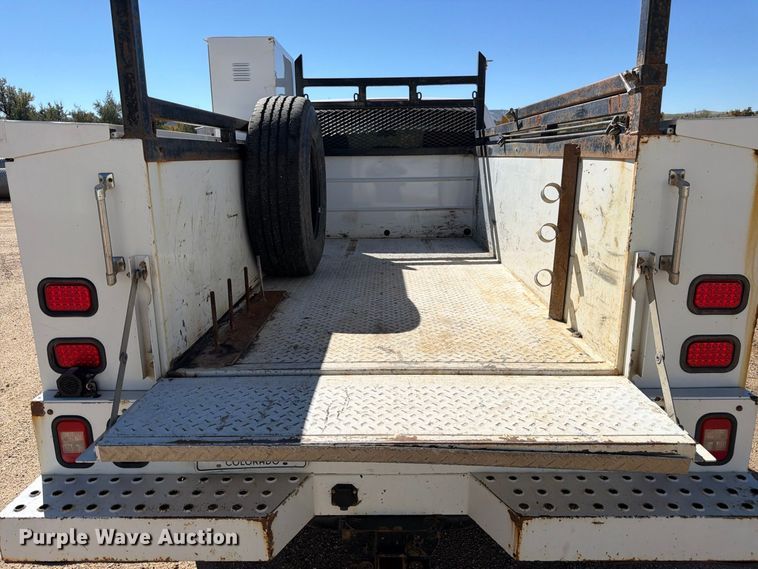 image for item FM7718 2020 RAM 3500 Crew Cab utility bed pickup truck