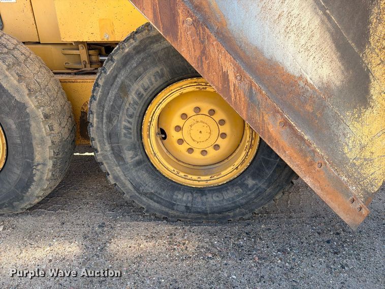 image for item FM7719 1997 Caterpillar 140H motor grader