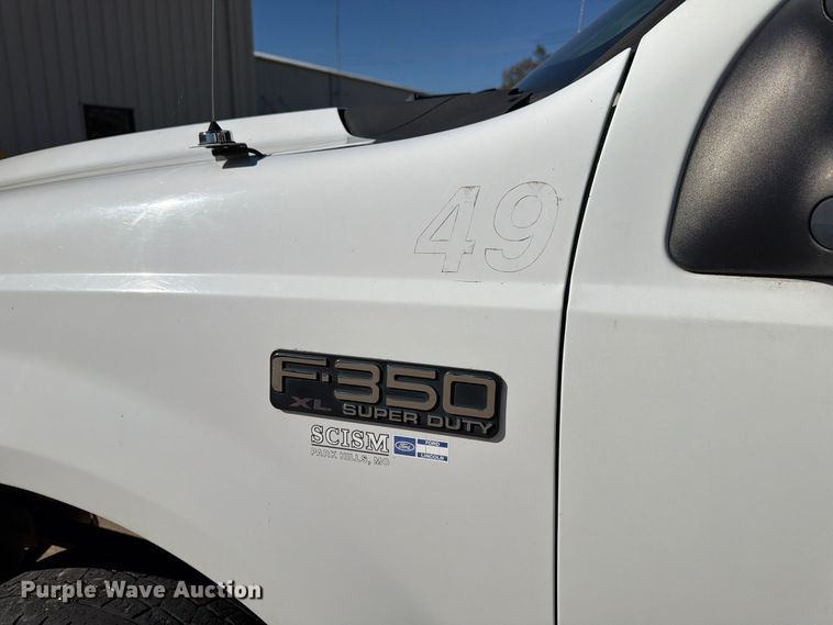 image for item FP3531 2004 Ford F350 Super Duty XL Crew Cab utility bed pickup truck