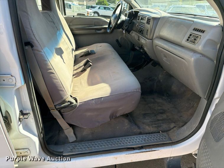 image for item FP3531 2004 Ford F350 Super Duty XL Crew Cab utility bed pickup truck