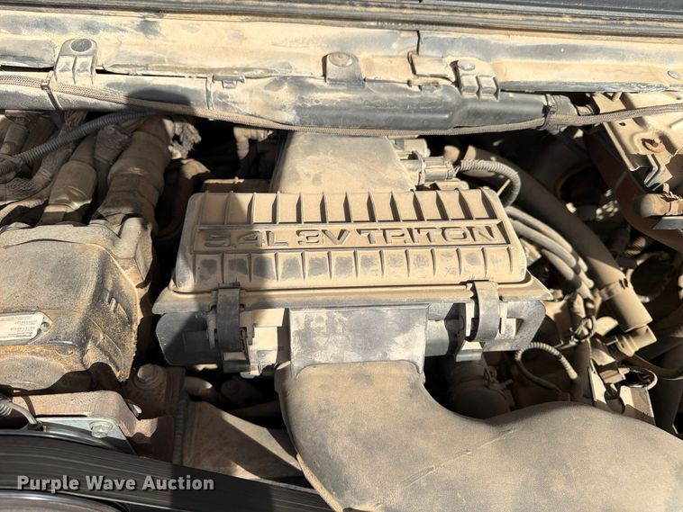 image for item FP3538 2005 Ford F350 Super Duty XL flatbed pickup truck