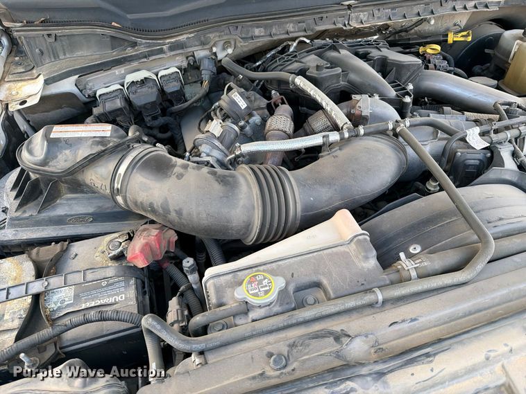 image for item FU5028 2017 Ford F250 Super Duty Ext. Cab flatbed pickup truck