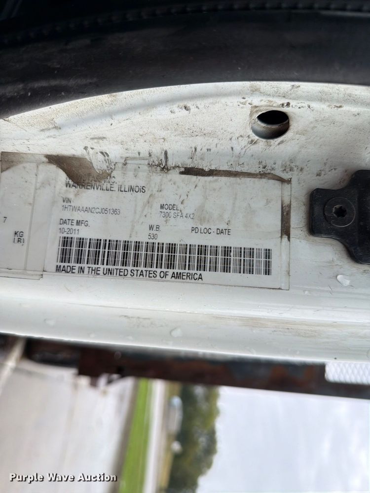 image for item NF9536 2012 International WorkStar 7300 Crew Cab flatbed truck