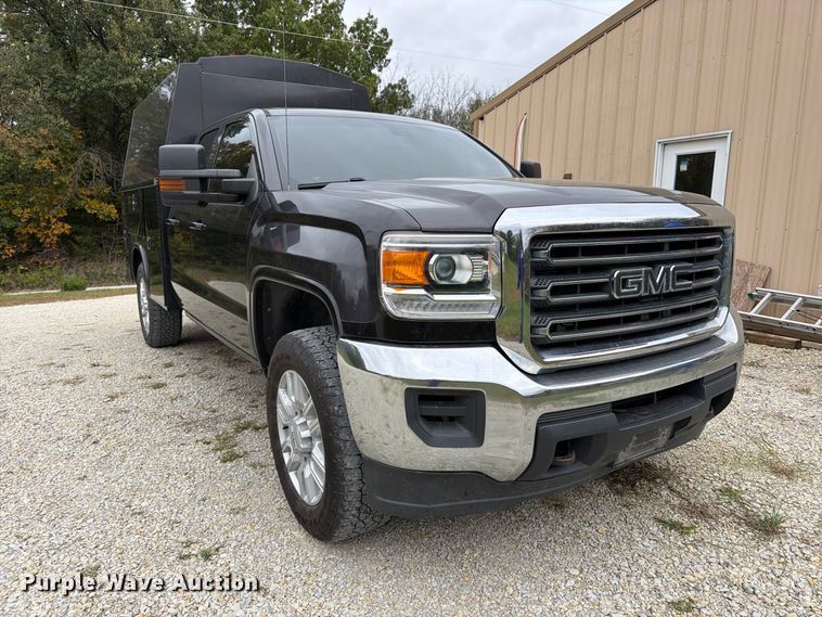 image for item DT3074 2016 GMC Sierra 3500HD Ext. Cab utility bed pickup truck