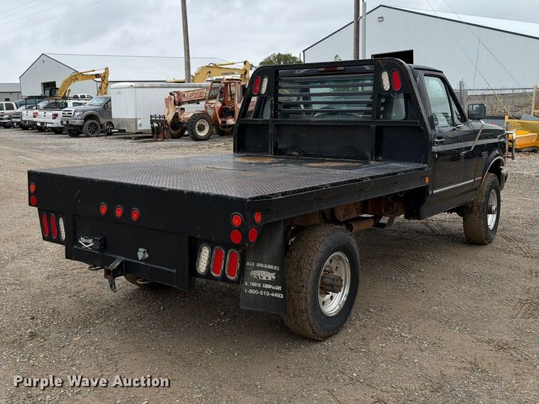 image for item EO8806 1995 Ford F250 XLT flatbed pickup truck