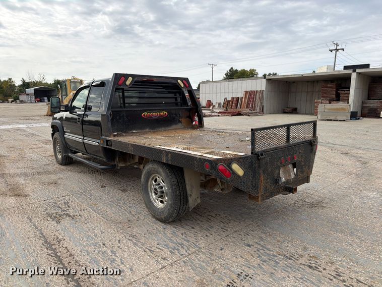 image for item EV7019 2006 GMC Sierra 2500HD Ext. Cab dump flatbed pickup truck