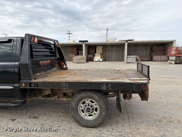 image for item EV7019 2006 GMC Sierra 2500HD Ext. Cab dump flatbed pickup truck