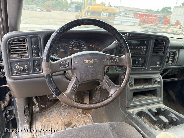 image for item EV7019 2006 GMC Sierra 2500HD Ext. Cab dump flatbed pickup truck