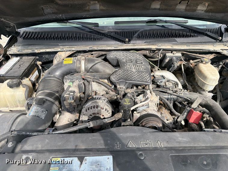 image for item EV7019 2006 GMC Sierra 2500HD Ext. Cab dump flatbed pickup truck