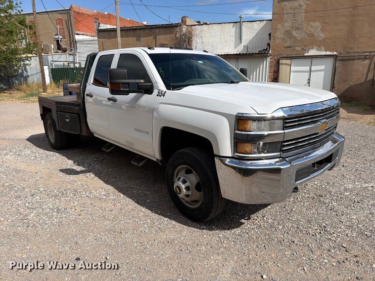 image for item EW7566 2015 Chevrolet Silverado 3500HD Crew Cab flatbed pickup truck