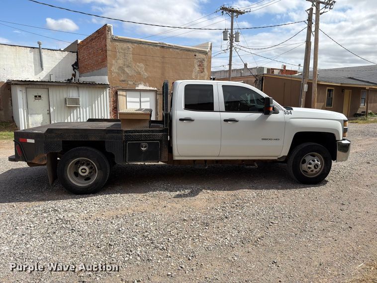 image for item EW7566 2015 Chevrolet Silverado 3500HD Crew Cab flatbed pickup truck