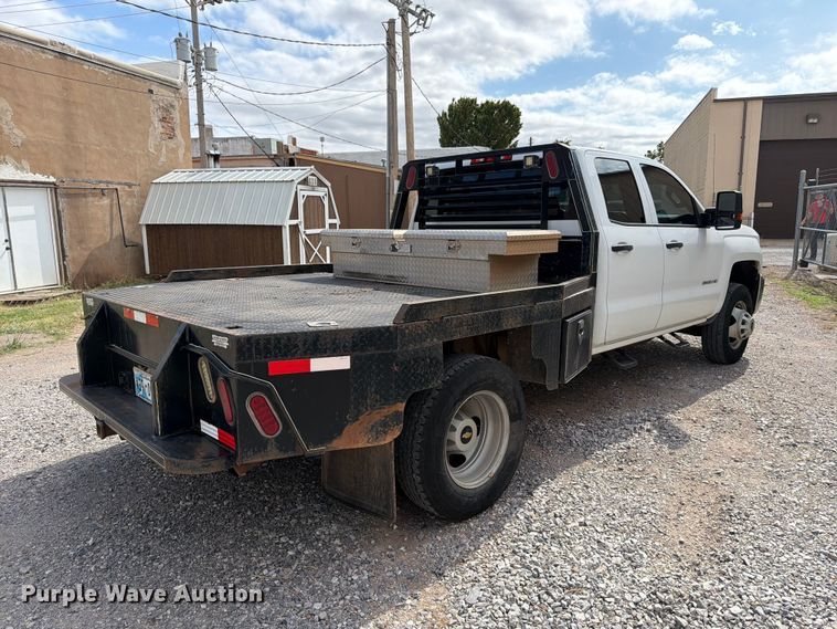 image for item EW7566 2015 Chevrolet Silverado 3500HD Crew Cab flatbed pickup truck
