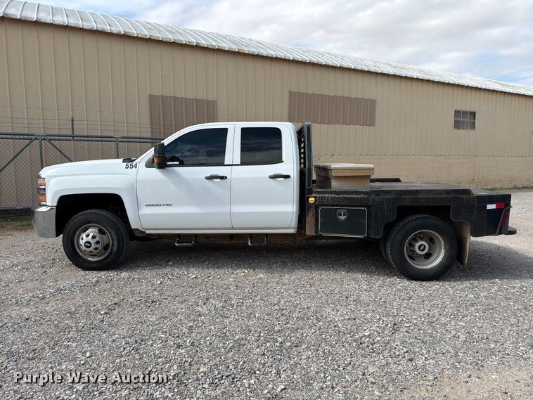 image for item EW7566 2015 Chevrolet Silverado 3500HD Crew Cab flatbed pickup truck