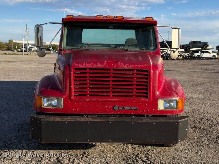 image for item EX1496 1997 International 4700 rollback truck
