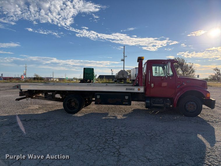 image for item EX1496 1997 International 4700 rollback truck