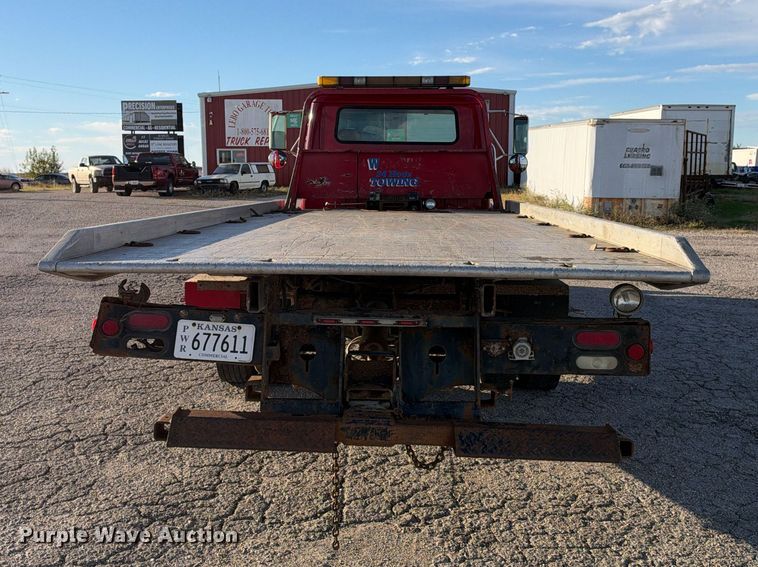 image for item EX1496 1997 International 4700 rollback truck