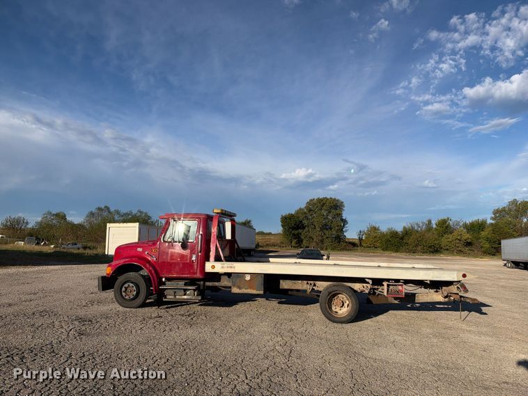 image for item EX1496 1997 International 4700 rollback truck