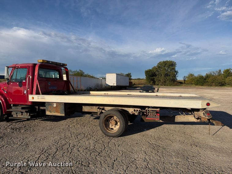 image for item EX1496 1997 International 4700 rollback truck