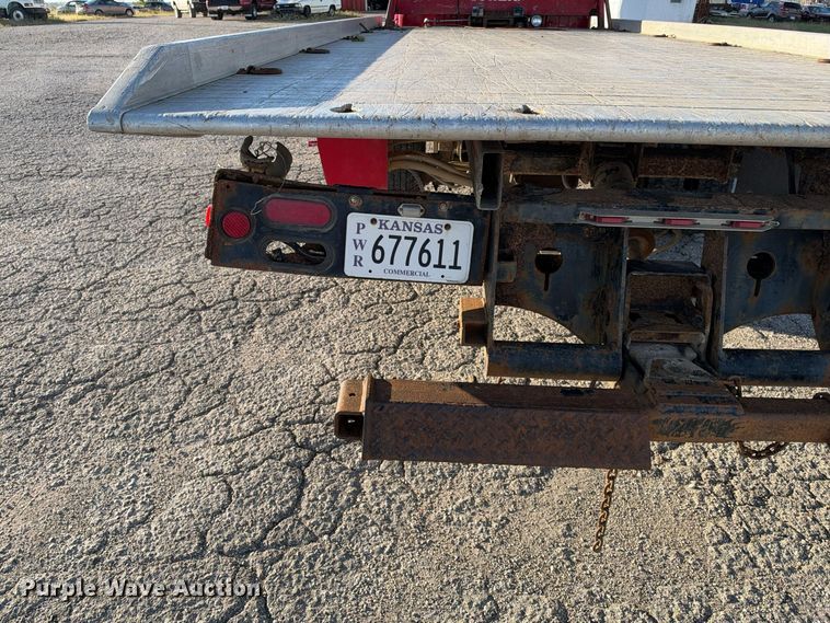 image for item EX1496 1997 International 4700 rollback truck