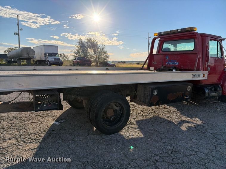 image for item EX1496 1997 International 4700 rollback truck