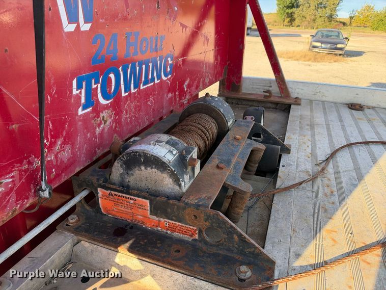 image for item EX1496 1997 International 4700 rollback truck