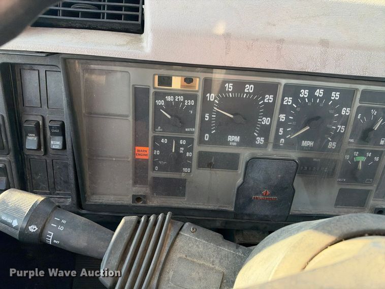 image for item EX1496 1997 International 4700 rollback truck