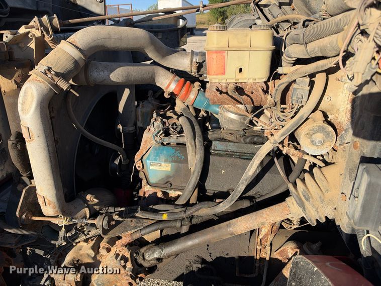 image for item EX1496 1997 International 4700 rollback truck