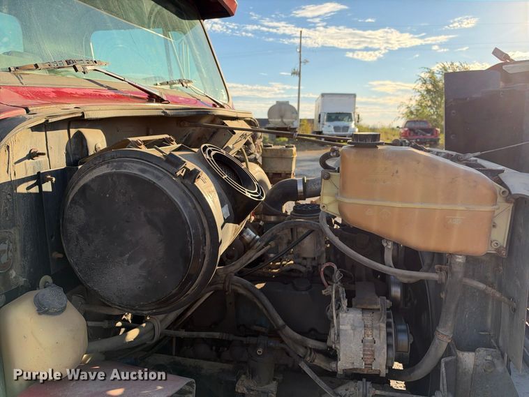 image for item EX1496 1997 International 4700 rollback truck