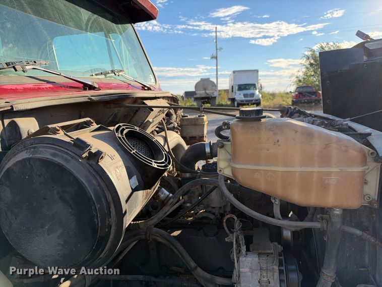 image for item EX1496 1997 International 4700 rollback truck