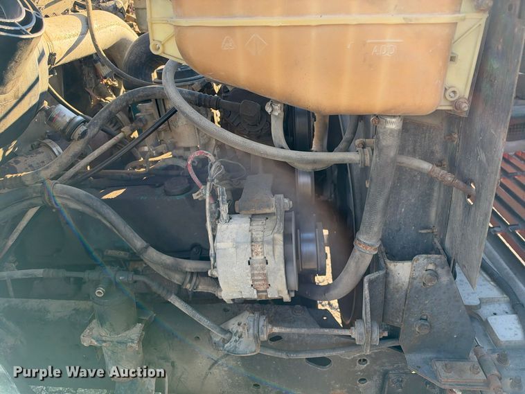 image for item EX1496 1997 International 4700 rollback truck