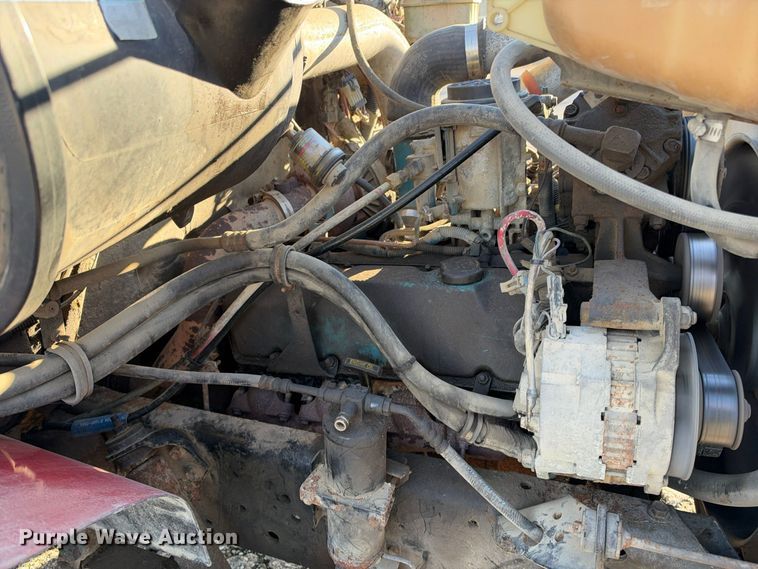 image for item EX1496 1997 International 4700 rollback truck