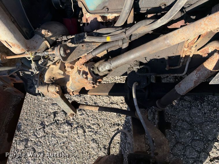 image for item EX1496 1997 International 4700 rollback truck