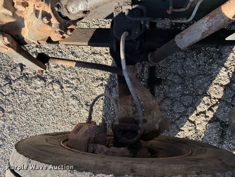 image for item EX1496 1997 International 4700 rollback truck