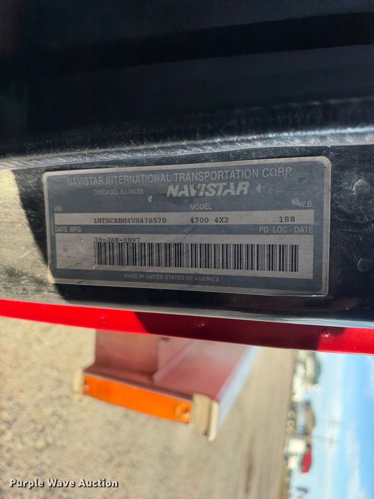 image for item EX1496 1997 International 4700 rollback truck
