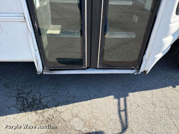 image for item FC3417 2003 Ford E350 shuttle bus
